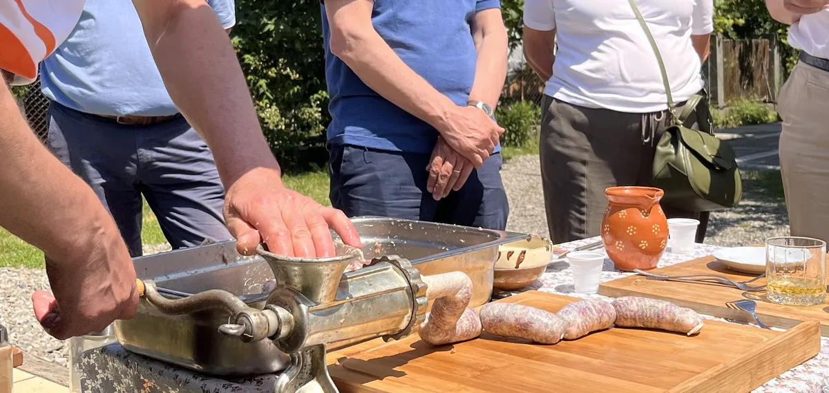 Dutch group learning how to make Moldavian sausages at cooking workshop in NE Romania