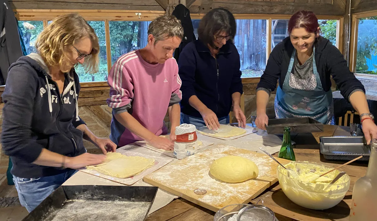 French group learning to prepare Lichiu, a traditional desert in Transylvania. Cobor village