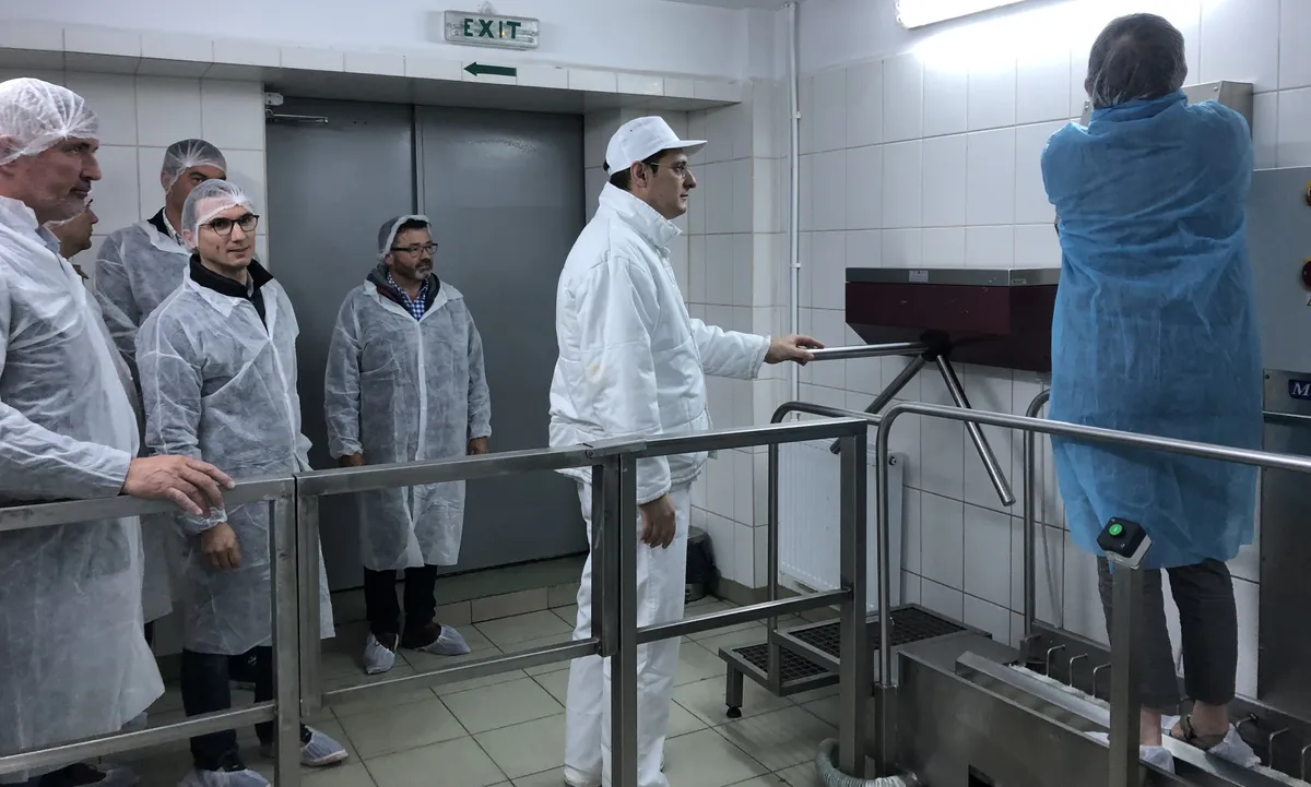 French group visiting a cheese factory