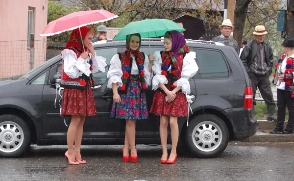 Young girls in traditional costumes celebrating the Orthodox Easter Maramures